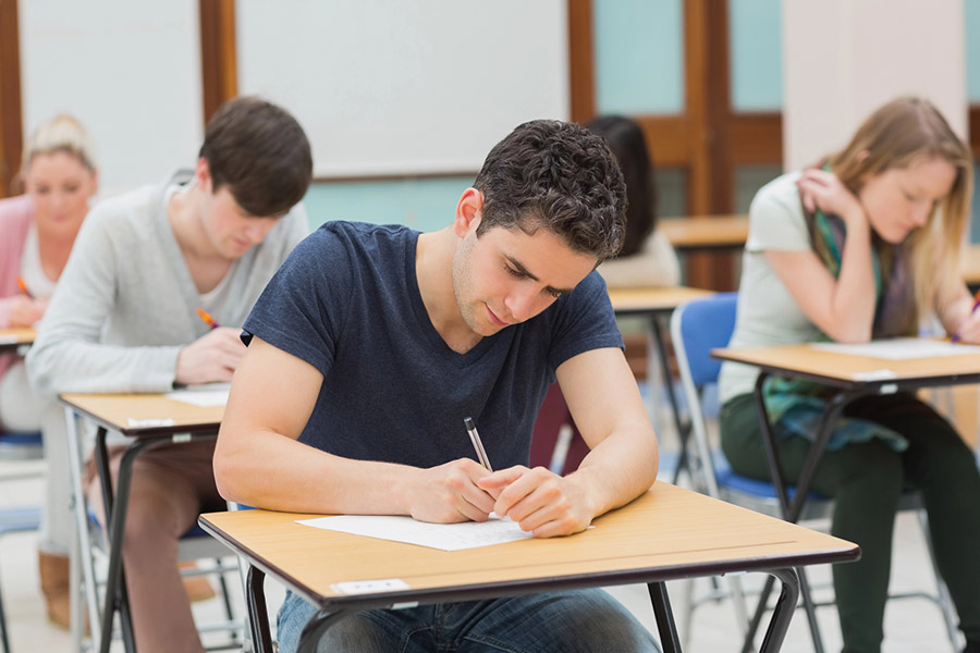 Students taking a test in a classroom in Statten Island